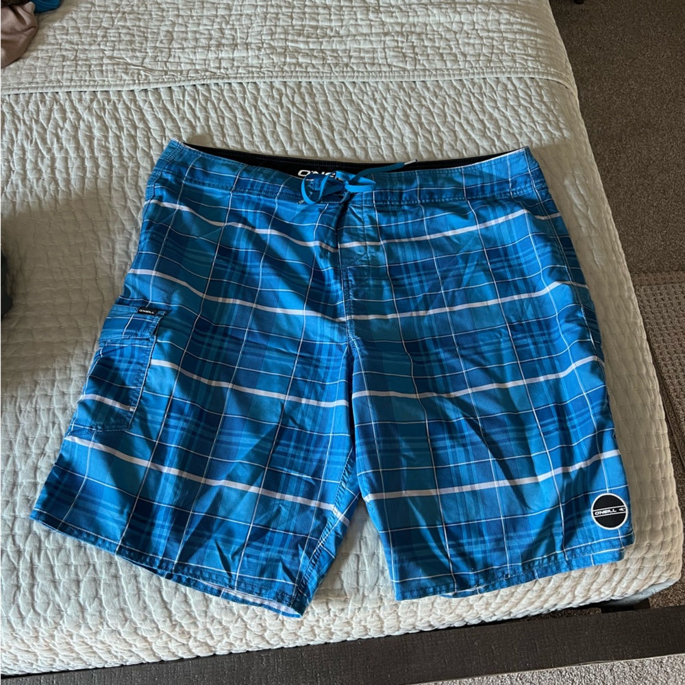 O’Neill blue plaid shorts. Size 42